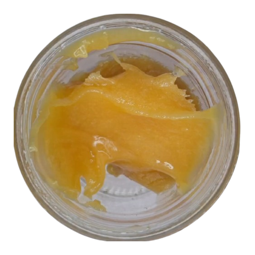 THCA Badder Wax in a clear container on a white background