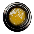 thca live resin in a black container on a white background